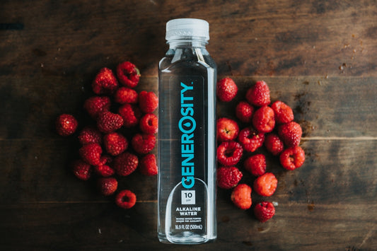 red strawberries in clear plastic bottle