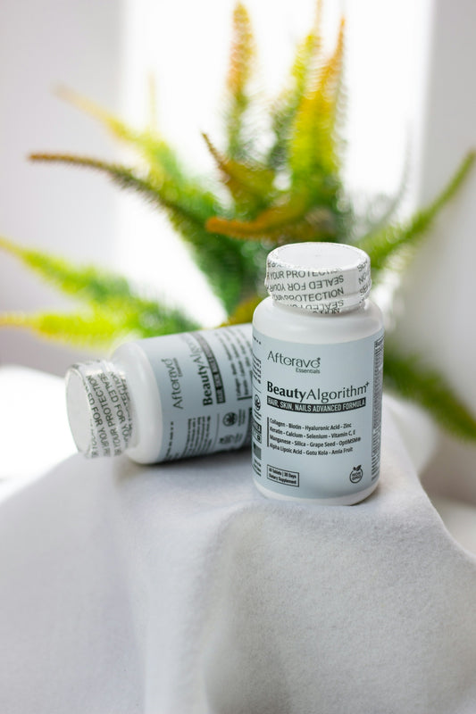 A close up of two bottles of medicine on a table